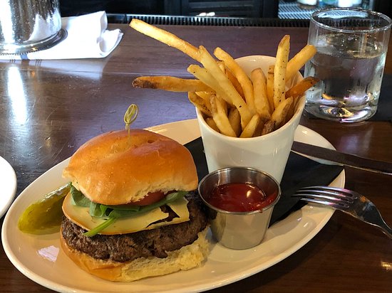 Bostonia Public House signature dishes BPH Burger, Lobster Roll, Raw Bar selections, Pig Board (charcuterie)