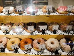 Twin Donuts signature dishes Honey-Dipped Donuts, Jelly Sticks, Breakfast Sandwiches