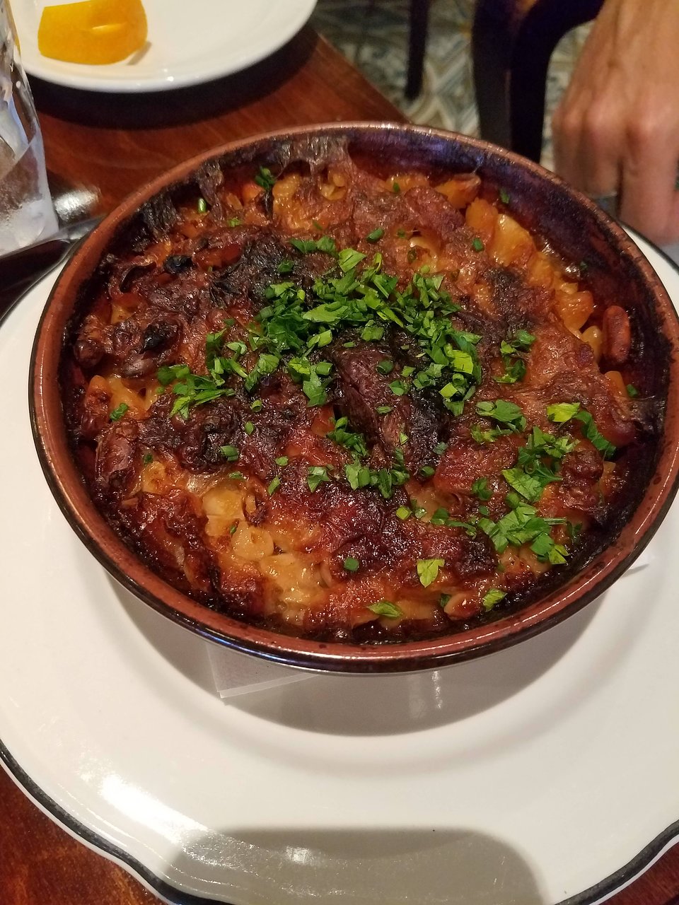 Le Bouillon signature dishes Cassoulet, French Onion Soup, Hanger Steak, Pork Rillettes Charcuterie, Crepe