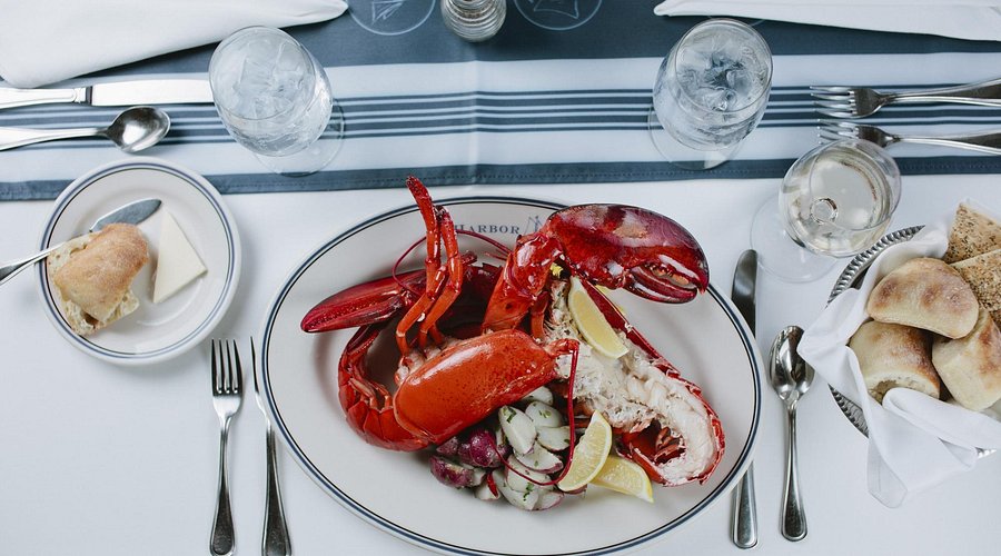 Harbor House signature dishes Oysters, Maryland-Style Crab Cake, Maine-Style Lobster Roll, Clam Chowder