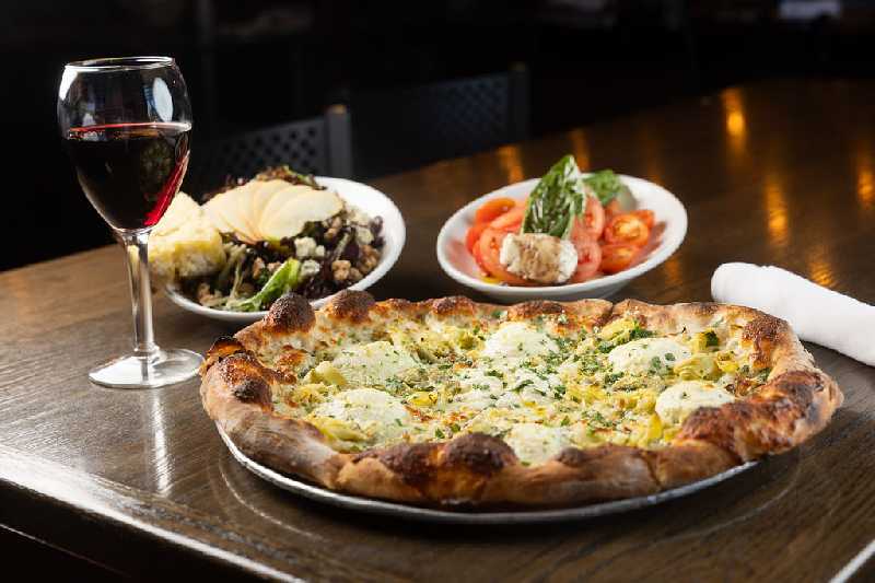 Farina Alto Pizzeria & Wine Bar signature dishes Margherita PizzaFunghi Pizza (Mushrooms, Truffle Oil)Bianca PizzaMeatballs al Forno