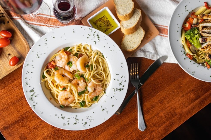 Joe's Pasta House signature dishes Joe's Famous ManicottiTour of Italy (Lasagna, Chicken Parmesan, Fettuccine Alfredo)Shrimp ScampiVeal Marsala
