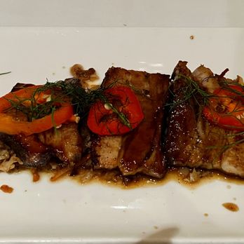 South Main Kitchen signature dishes The menu changes seasonally. Past items include Seared Scallops, Pork Belly, and Shrimp & Grits.