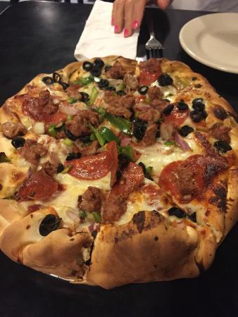 Deerhead Pizza Tavern signature dishes Double Decker PizzaStromboliItalian Salad with Creamy Italian DressingBeer Battered Mushrooms