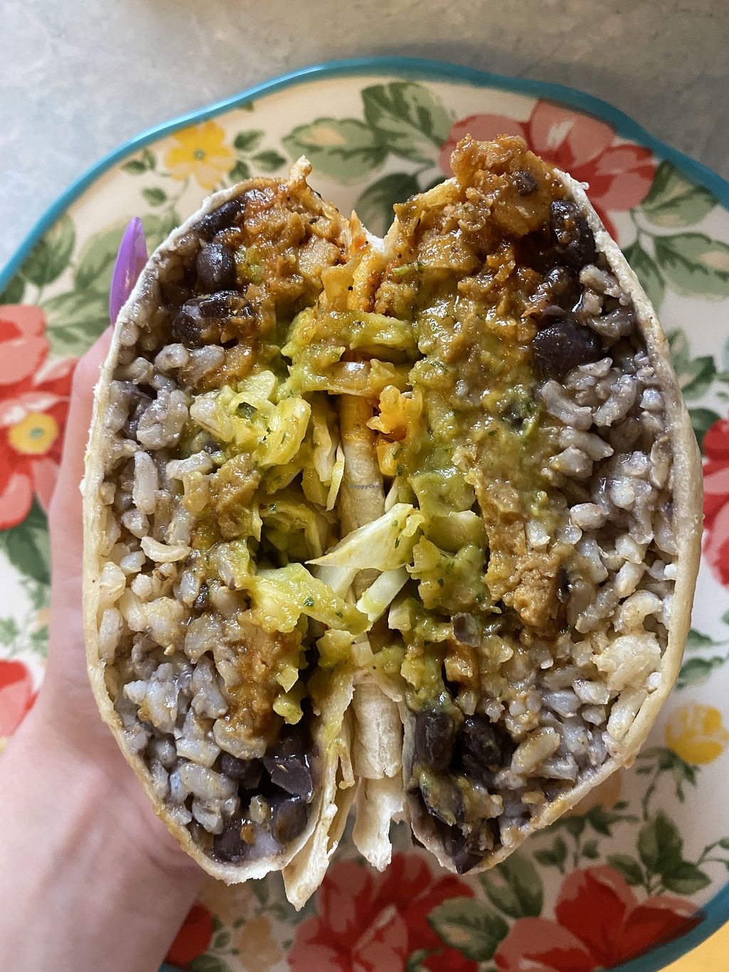 Cali Burrito signature dishes Guaco-Taco, Santa Barbara Chicken Burrito, The Kraken Burrito, Carne Asada Fries
